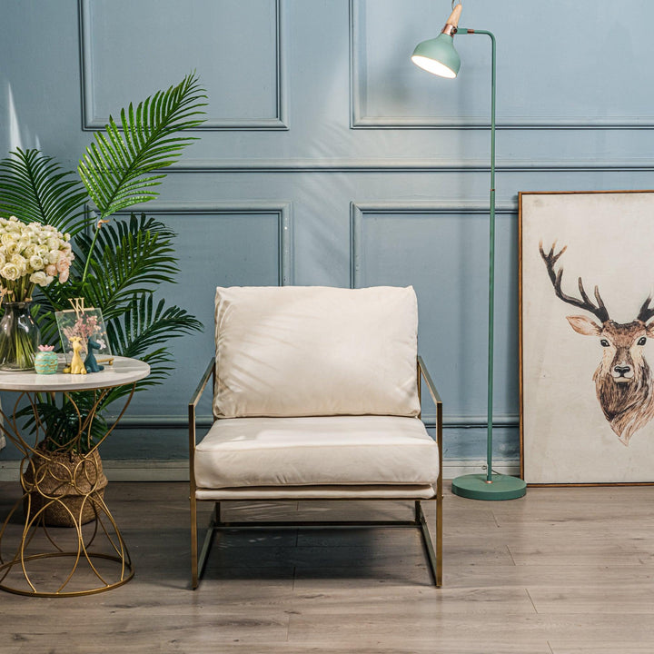 Fauteuil de salon en métal et velours beige