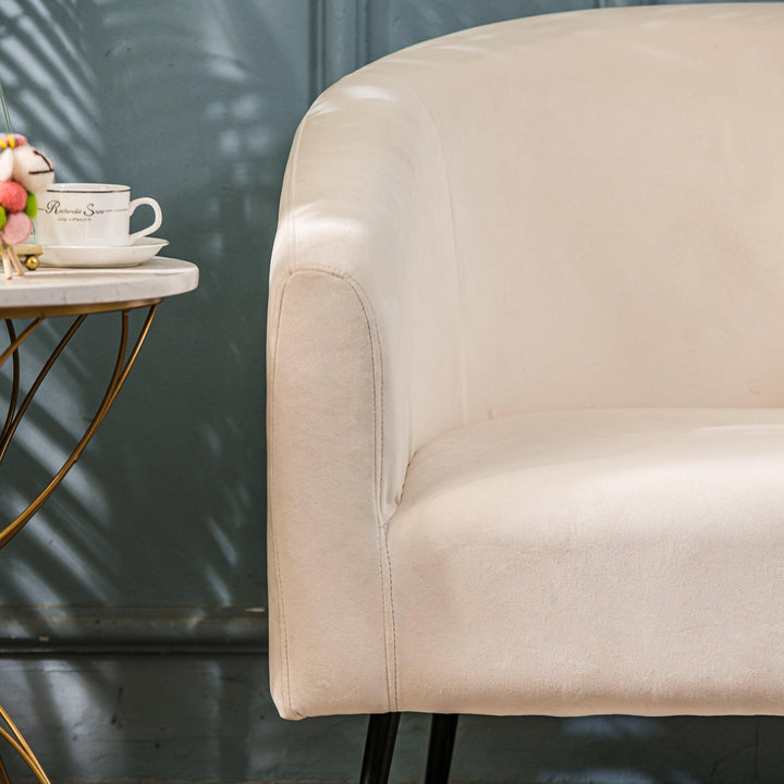 Fauteuil de salon en métal et velours beige